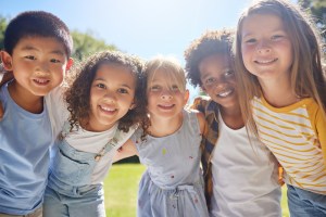 Group of kids smiling.
